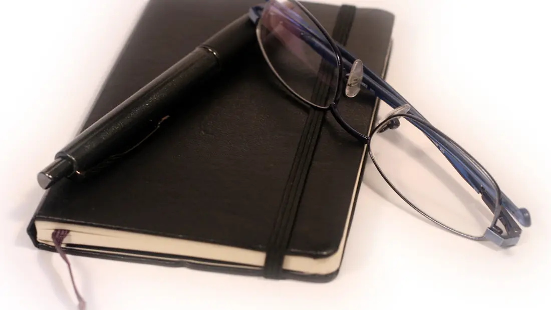 A tutor planning a schedule transition on a calendar